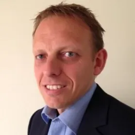 Headshot of ABI Research Distinguished Analyst Michael Larner